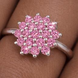 cluster moissanite ring on models finger pink
