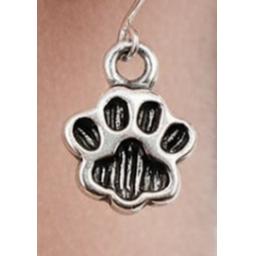 Paw print earrings in ear